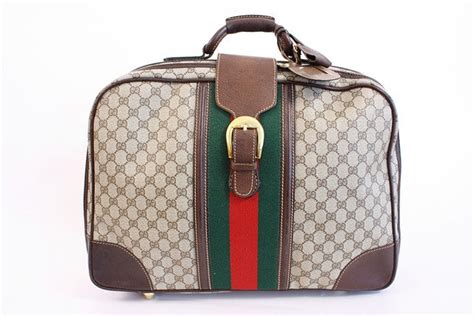 vintage gucci carry on|old Gucci luggage.